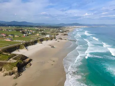 an aerial view of a beach with the ocean at Playa a Rapadoira - Foz in Foz