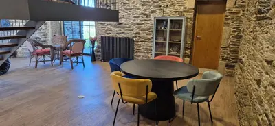 a dining room with a table and chairs at Casa Escuela Sanguñedo in Magdalena