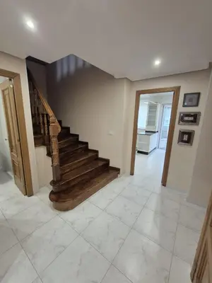 a hallway with a staircase in a house at Alfonso X Lucus Confort in Lugo