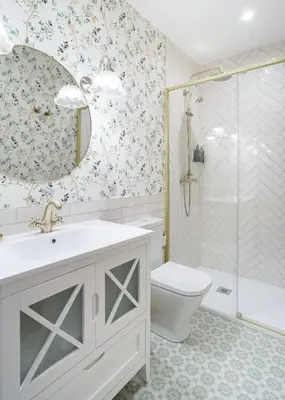a bathroom with a sink and a toilet and a shower at Casa San Blas in Verín
