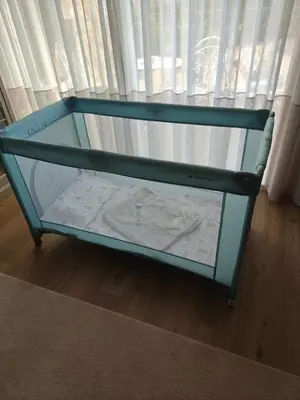 a glass container with a table in front of a window at Aqua Celenis in Caldas de Reis