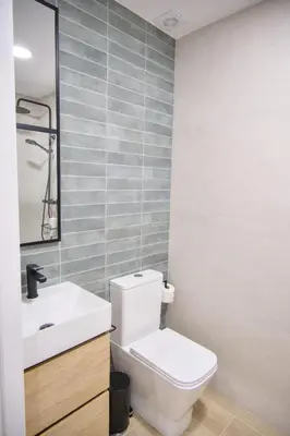 a kitchen and dining room with a table and chairs at Aqua Celenis in Caldas de Reis