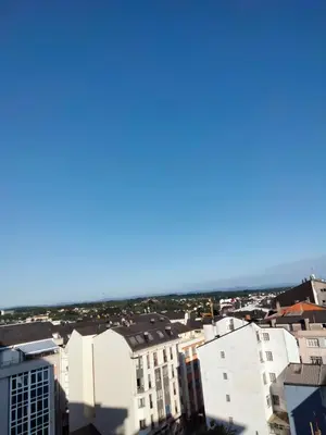 a view of the ocean from the roof of a building at Estudio panorámico in Lugo
