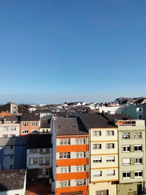an aerial view of a city with buildings at Estudio panorámico in Lugo