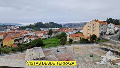 a view of a city with buildings and a street at Apartamento CORAZÓN DE MIÑO in Miño