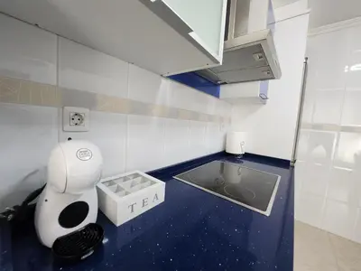 a small bathroom with a toilet and a sink at SayCa CREDENCIAL in Sarria