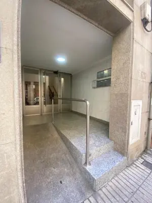 an empty hallway of a building with a staircase at O nido de David, un refuxio urbano na Ribeira Sacra in Monforte de Lemos