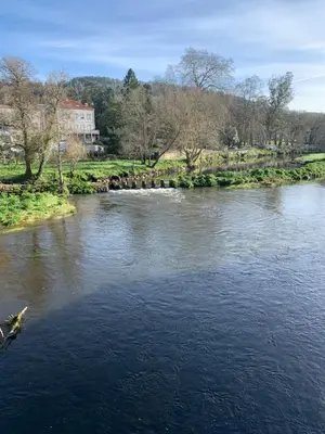 a view of a river from a bridge at O Victoriano in Caldas de Reis