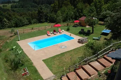 an overhead view of a swimming pool in a yard at Nuevo sabor rural Ribeira Sacra in A Pobra do Brollon