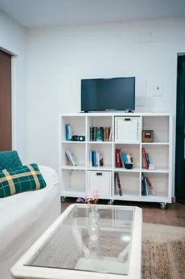 a living room with a tv and a coffee table at Casa Milladoiro in Miño