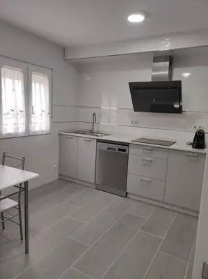 a kitchen with a sink and a counter top at Piso en Valadouro in Valle de Oro