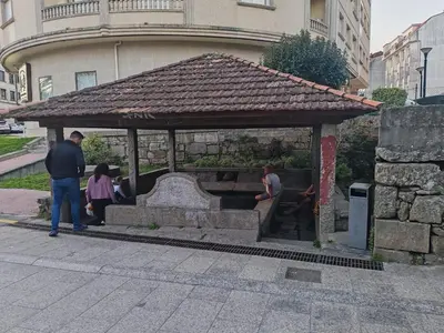 a group of people standing in a gazebo at Loft Luxury in Caldas de Reis
