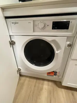 a microwave oven sitting on top of a cabinet at Bulebule - Acogedor apartamento en pleno centro de Ourense in Ourense