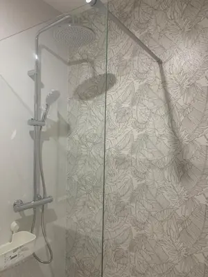 a shower with a glass door in a bathroom at Apartamento en Xinzo de Limia in Xinzo de Limia
