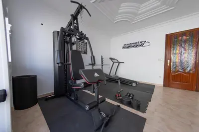 a room with a gym with a treadmill at Duplex en Burela Mi Piso 90 in Burela de Cabo