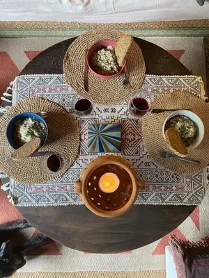a table with bowls of food and an egg on it at O Freixo in A Capela