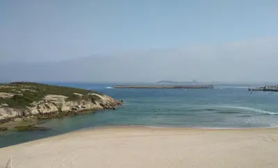 a view of a beach with the ocean at Atico Deluxe Limosa romántico moderno junto al mar in San Ciprián