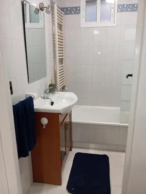 a bathroom with a sink and a bath tub and a sink at Alojamientos El Bierzo in Ponferrada