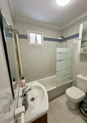 a bathroom with a sink and a toilet and a shower at Alojamientos El Bierzo in Ponferrada