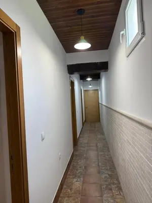 an empty hallway with a hallwayngthngthngthngthngthngthngthngthngthngth at Primavera in Padrón