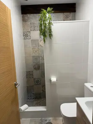 a bathroom with a shower and a toilet at Primavera in Padrón