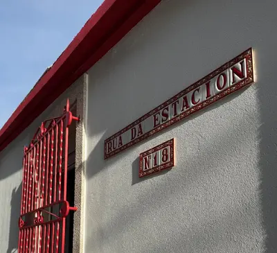 a sign on the side of a building at Primavera in Padrón