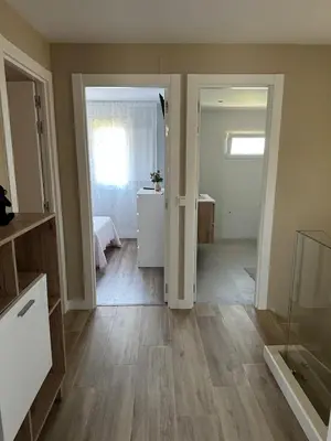an empty room with a bathroom and a bedroom at Villa Doce in Puentecesures