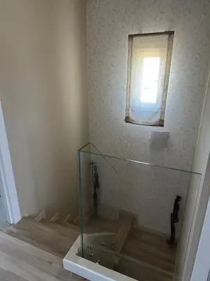a glass shower in a bathroom with a window at Villa Doce in Puentecesures