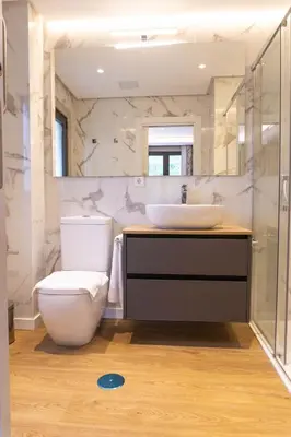 a bathroom with a toilet and a sink at Treixadura in Pincelo