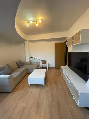 a living room with a couch and a tv at El Bierzo - Ponferrada in Ponferrada
