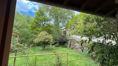 a view of a garden from a house at Couso Relax in Sarreaus