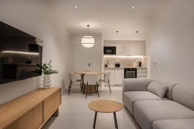a living room with a couch and a table at Loft América 41 A in Melide