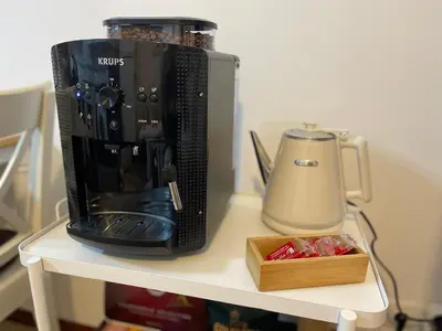a coffee maker sitting on top of a shelf at Rei Túzaro in Milladoiro