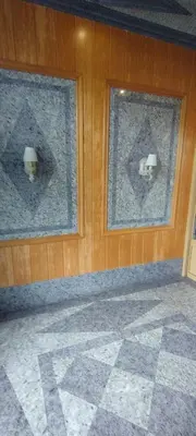 a room with two windows and a tiled floor at Apartamento Los Gallegos in Foz