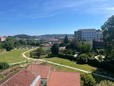 an aerial view of a city with buildings and trees at Vistas del Parque in Santiago de Compostela