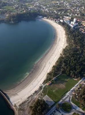 an aerial view of a beach and a body of water at Casa Fonfría in Cabañas
