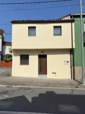 a house on the side of a street at Casa de Conxo in Santiago de Compostela