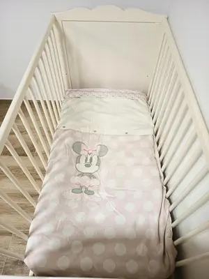 a small bed with a teddy bear on it at Casa Do Castelo in Lugo