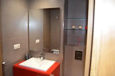 a bathroom with a sink and a mirror at Orballo Alaricano in Allariz