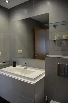 a bathroom with a sink and a mirror at Orballo Alaricano in Allariz