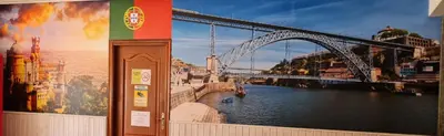 a large painting of a bridge over a river at Hotel Luso Leixoes-Exclusivo para Empresas in Bergondo