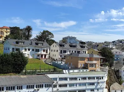 a group of houses in a town with a building at Figueras 3 in figueras