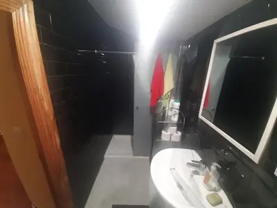 a bathroom with a sink and a mirror at Casa valido in Lago