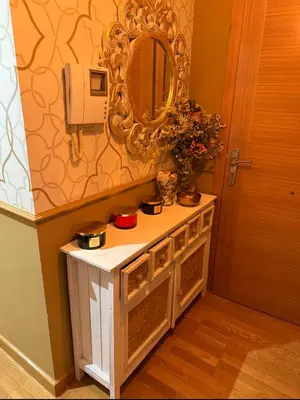 a bathroom with a vanity with a mirror and a sink at Apartamento centro de Foz con piscina in Foz