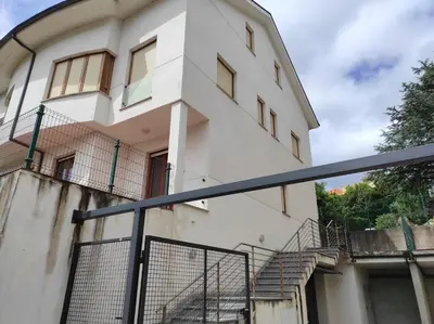 a building with a fence in front of it at Figueras 6 in figueras
