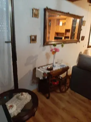 a living room with a table and a couch at Medulillas de Yeres in Yeres