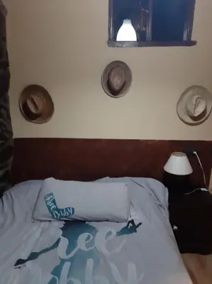 a bedroom with a bed with a head board at Medulillas in Yeres
