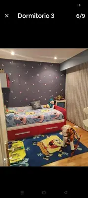 a childs bedroom with a bed with a cartoon at Precioso piso en Ribadavia in Ribadavia