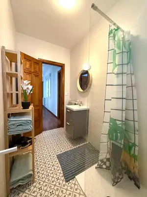 a bathroom with a shower and a sink at Apartamento a Un Paso de la Playa de Tapia in Tapia de Casariego