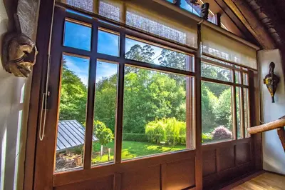 an open door with a view of a garden outside at Villa rural en Playa de Frejulfe in Frejulfe